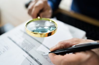 Fraud Detective Using Magnifying Glass Fraud Detective Using Magnifying Glass