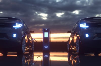 Electric cars charging at a charging station. 3d rendering Electric cars charging at a charging station. 3d rendering