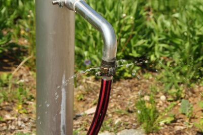 leaky connection of a garden hose. leaky connection of a garden hose.